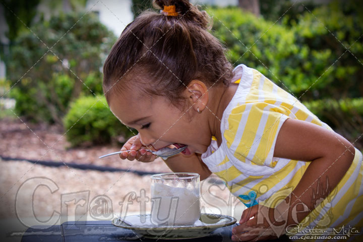 Kira eating the frozen treat Kira eating the frozen treat