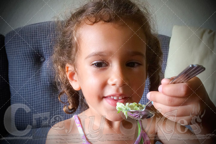 Kira eating Spinach-Tuna Salad Kira helping us put the cream cheese into the prunes