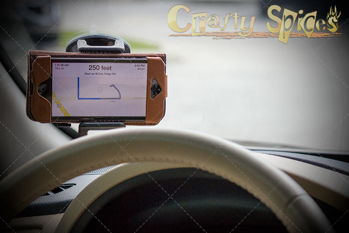 TaoTronics® Universal Windshield and Dashboard Car Mount Cradle Holder - holding an iPhone TaoTronics® Universal Windshield and Dashboard Car Mount Cradle Holder - holding an iPhone