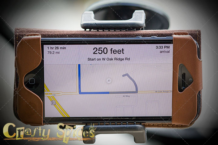 TaoTronics® Universal Windshield and Dashboard Car Mount Cradle Holder - holding an iPhone TaoTronics® Universal Windshield and Dashboard Car Mount Cradle Holder - holding an iPhone