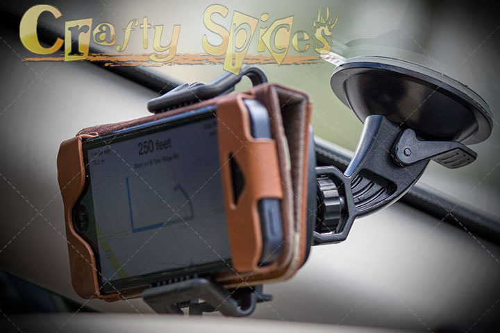 TaoTronics® Universal Windshield and Dashboard Car Mount Cradle Holder - holding an iPhone TaoTronics® Universal Windshield and Dashboard Car Mount Cradle Holder - holding an iPhone