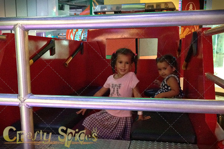 Kira and Kaylee in the firefighters truck