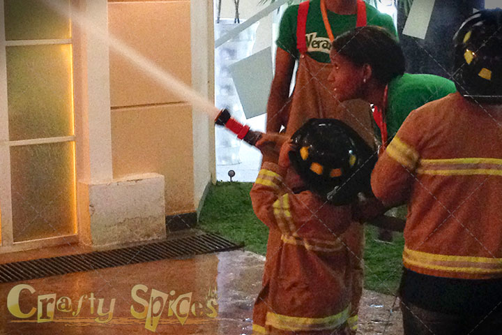 Kira the firefighters turning off a fire